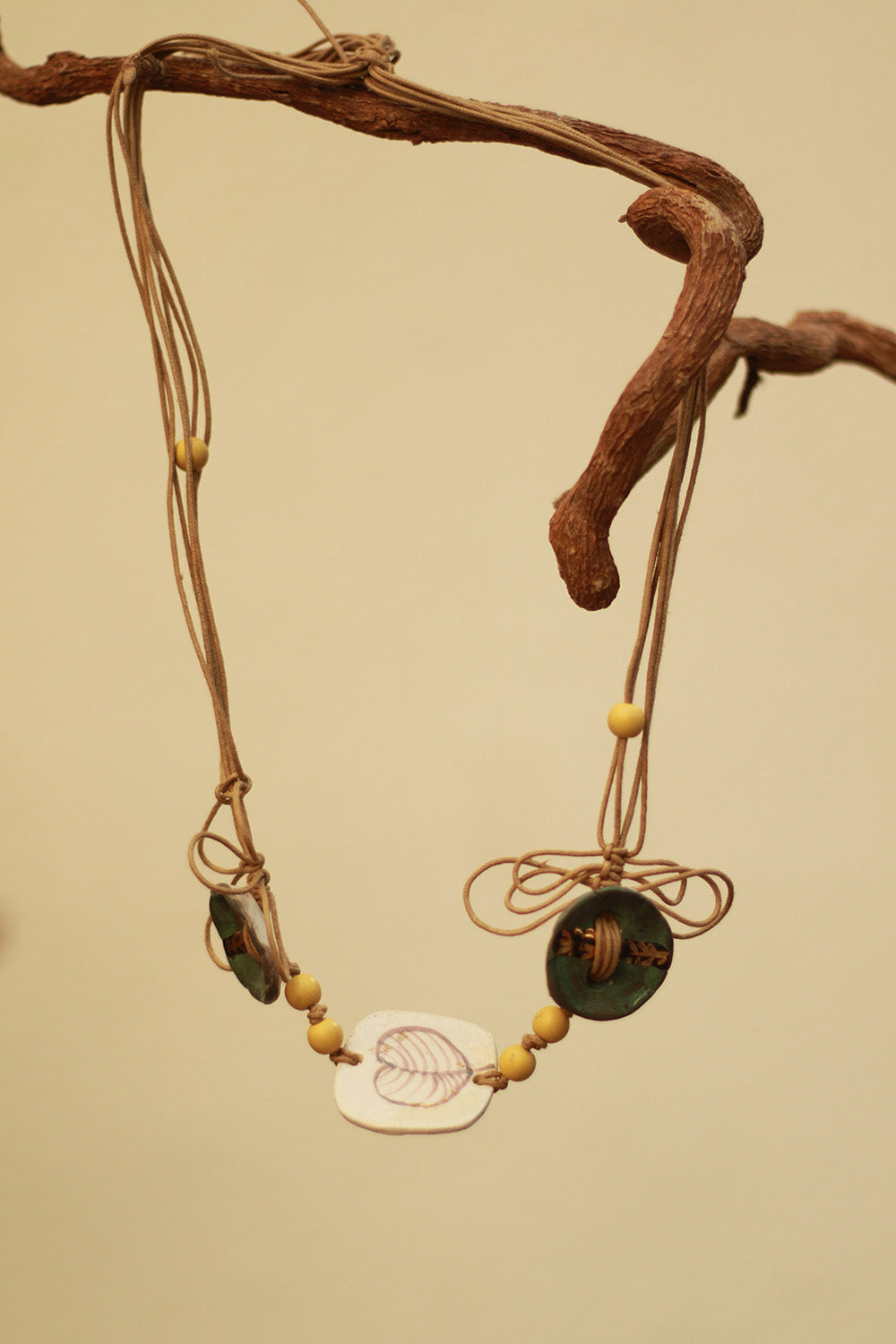 Mrida | Ceramic Necklace | Leaf Disc