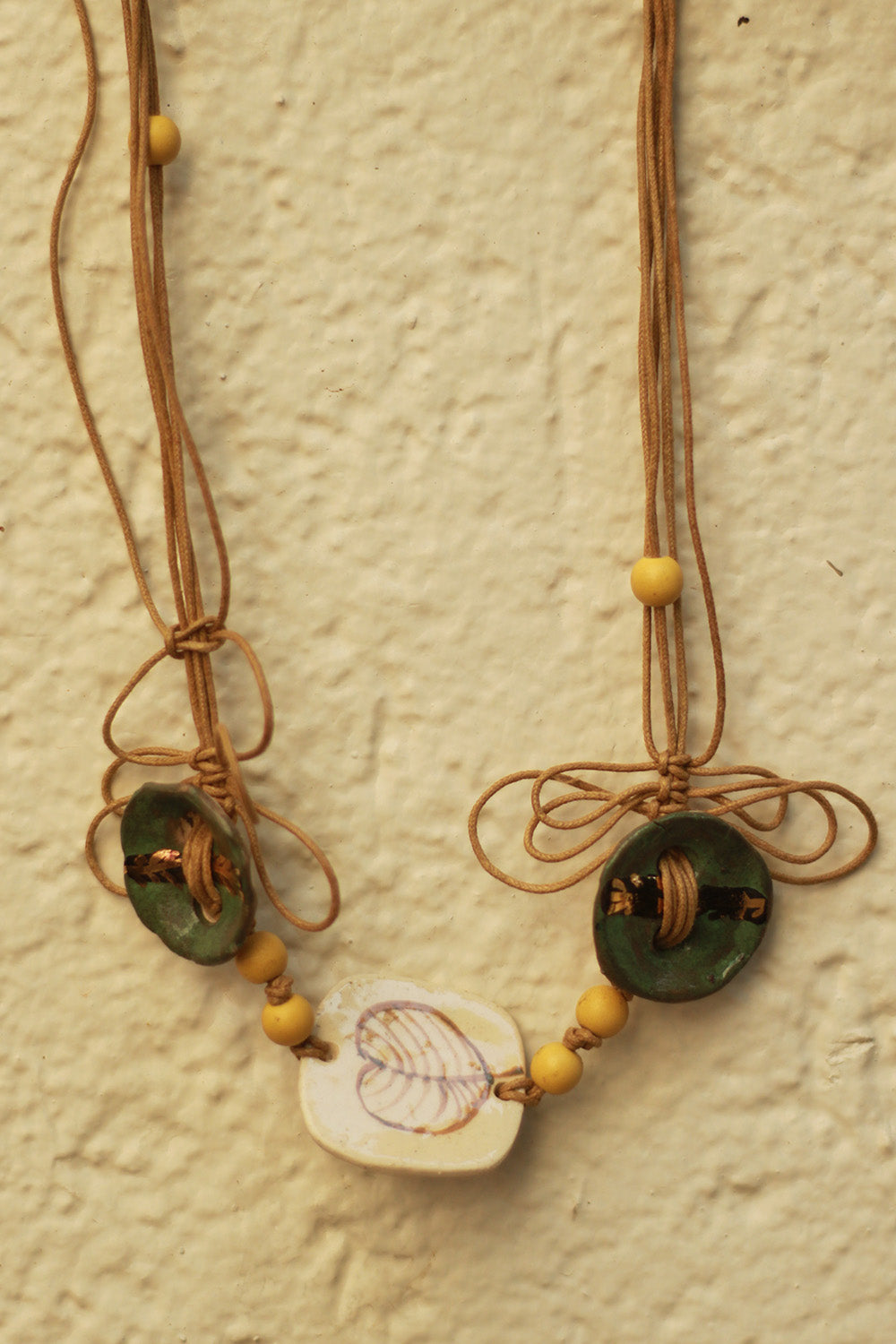 Mrida | Ceramic Necklace | Leaf Disc