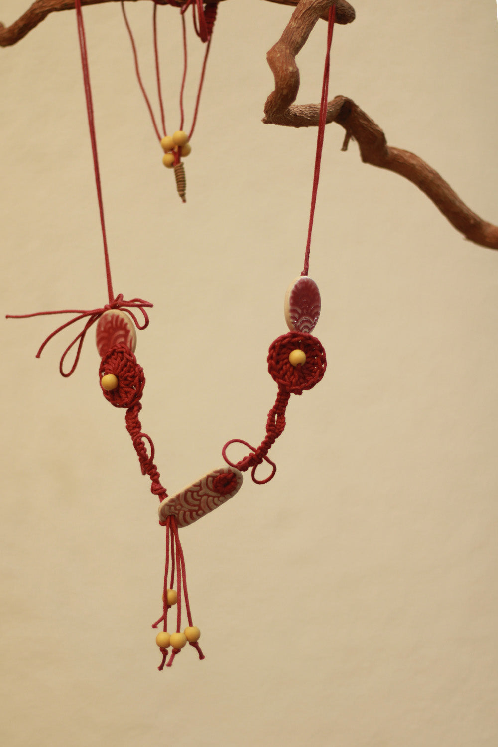 Mrida | Ceramic Necklace | Maroon Disc with Crochet