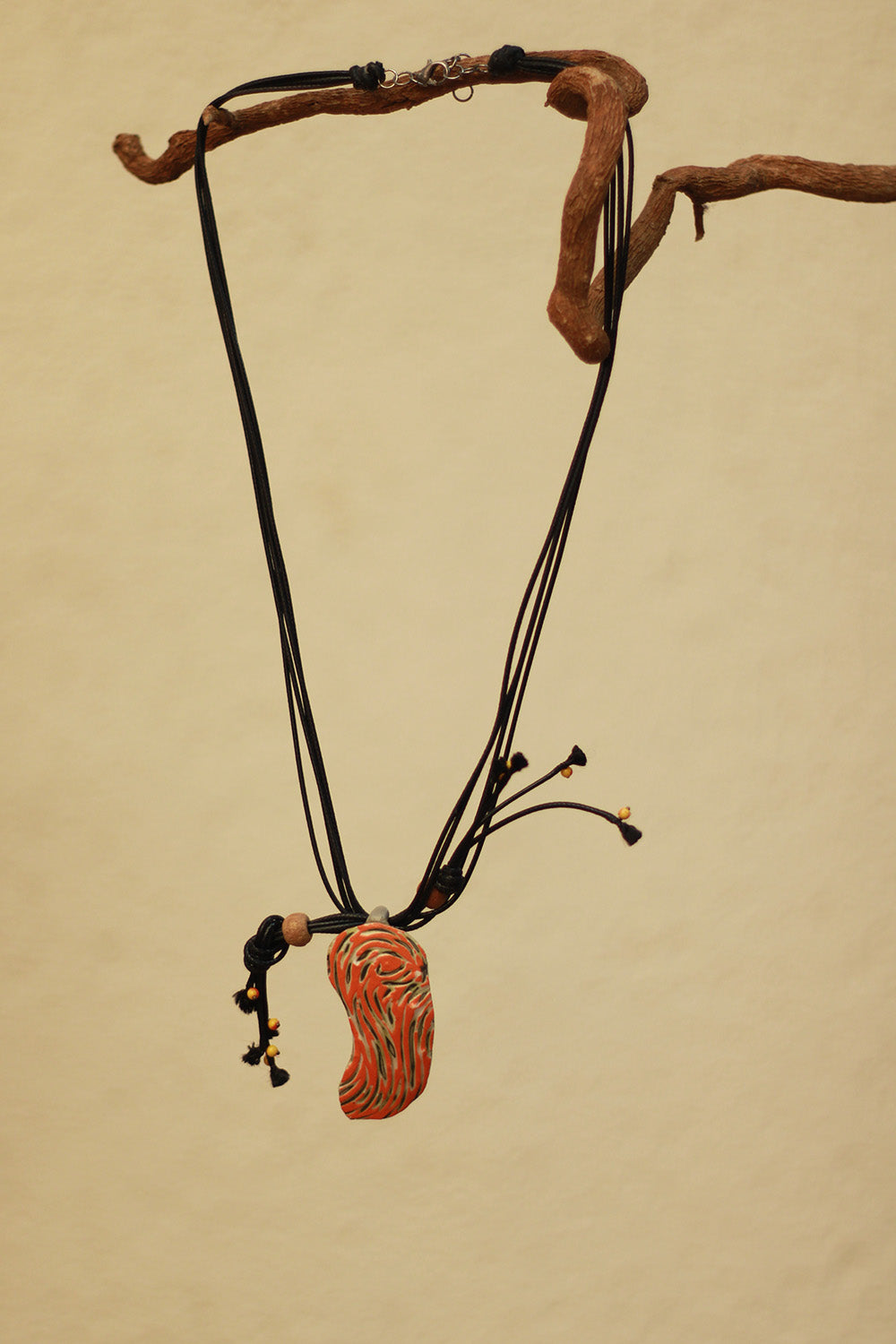 Mrida | Ceramic Necklace | Orange Swirl Pendant