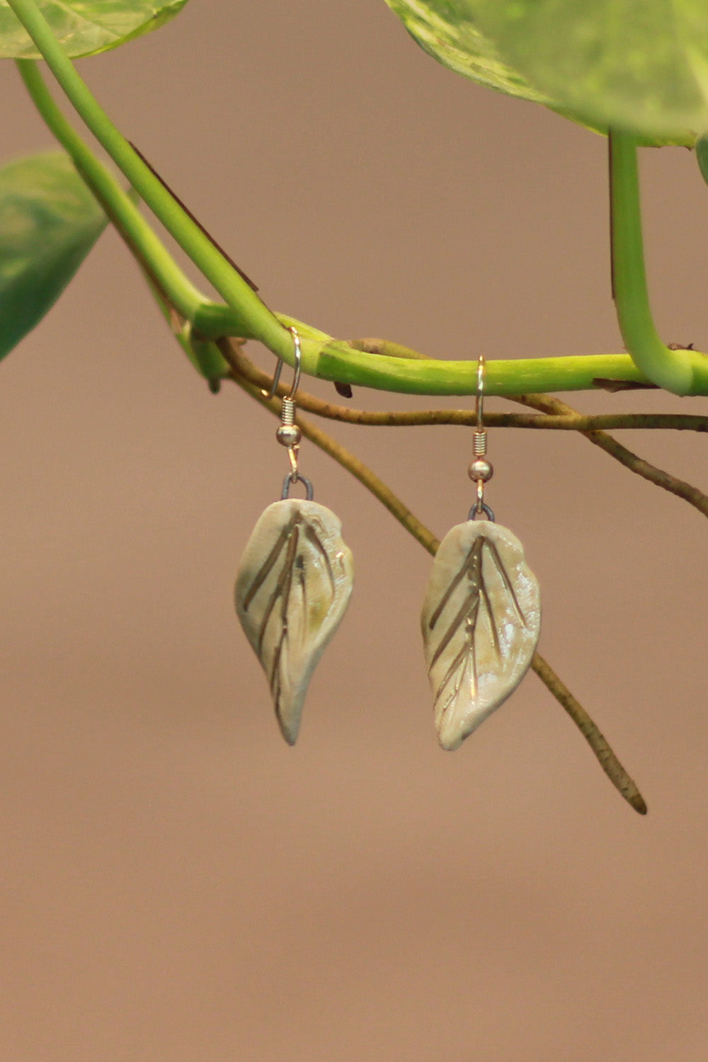 Sadhvi | Ceramic Leaf Earrings | Green with tinge of gold