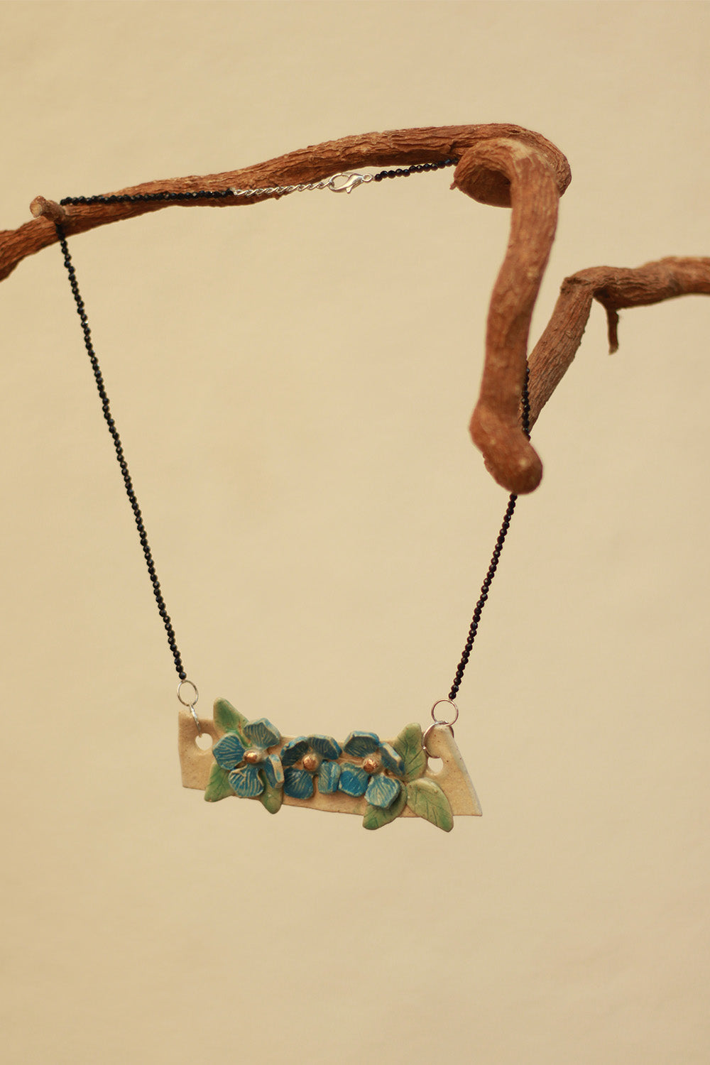 Mrida | Ceramic Necklace | Blue Flower