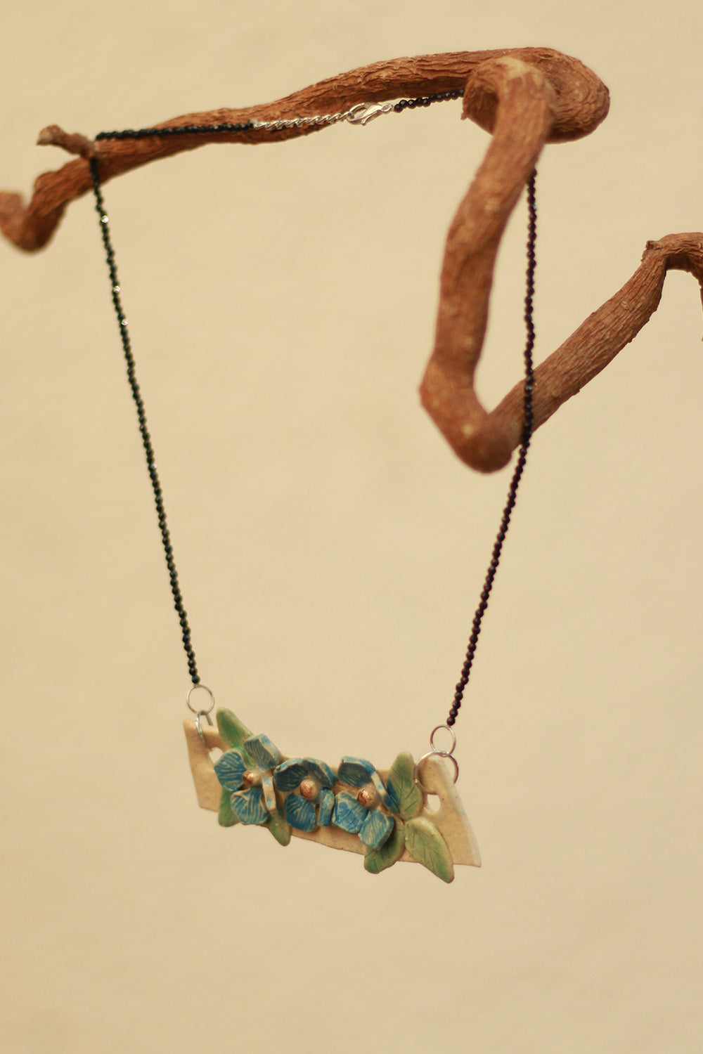 Mrida | Ceramic Necklace | Blue Flower