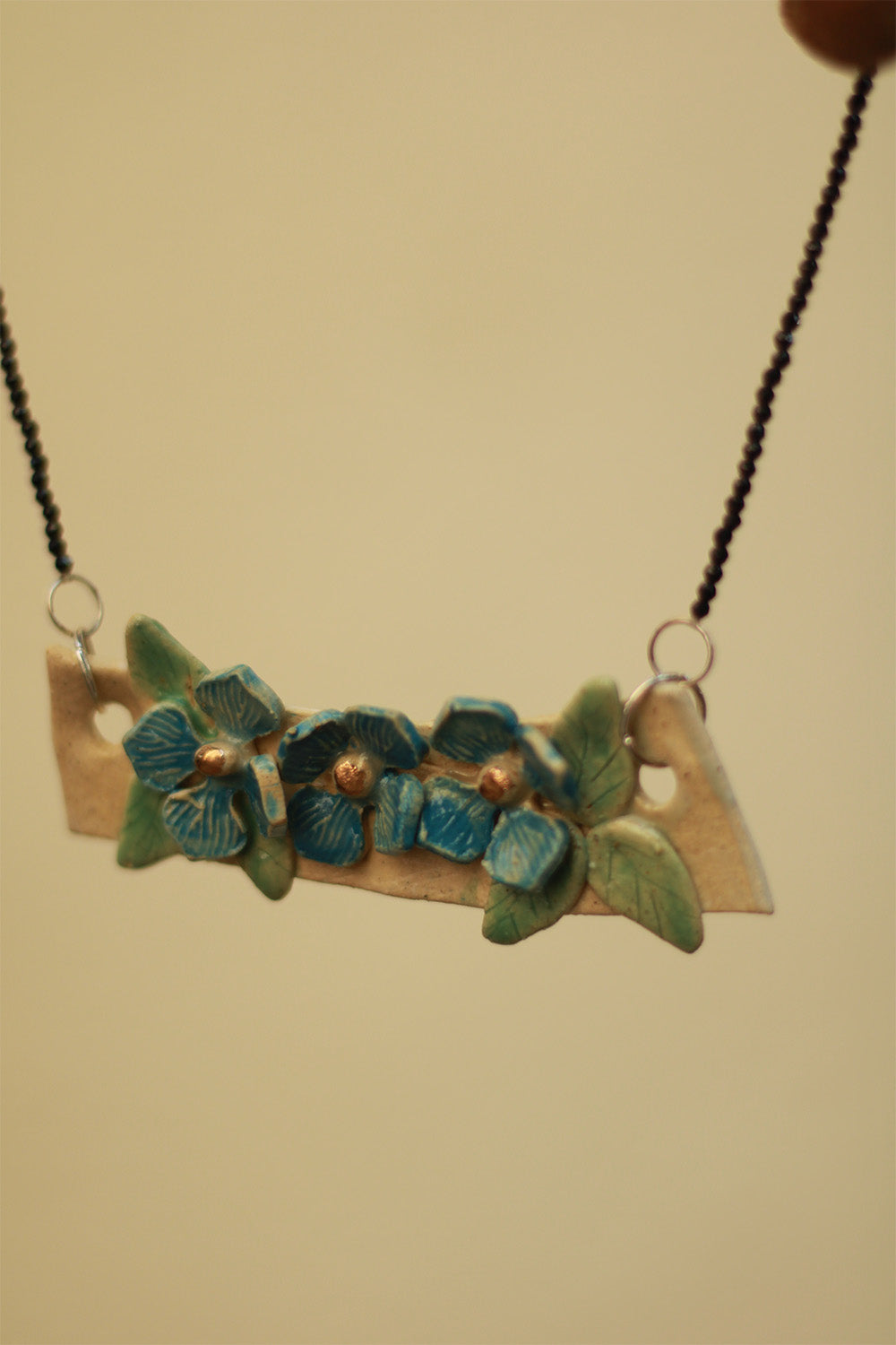 Mrida | Ceramic Necklace | Blue Flower