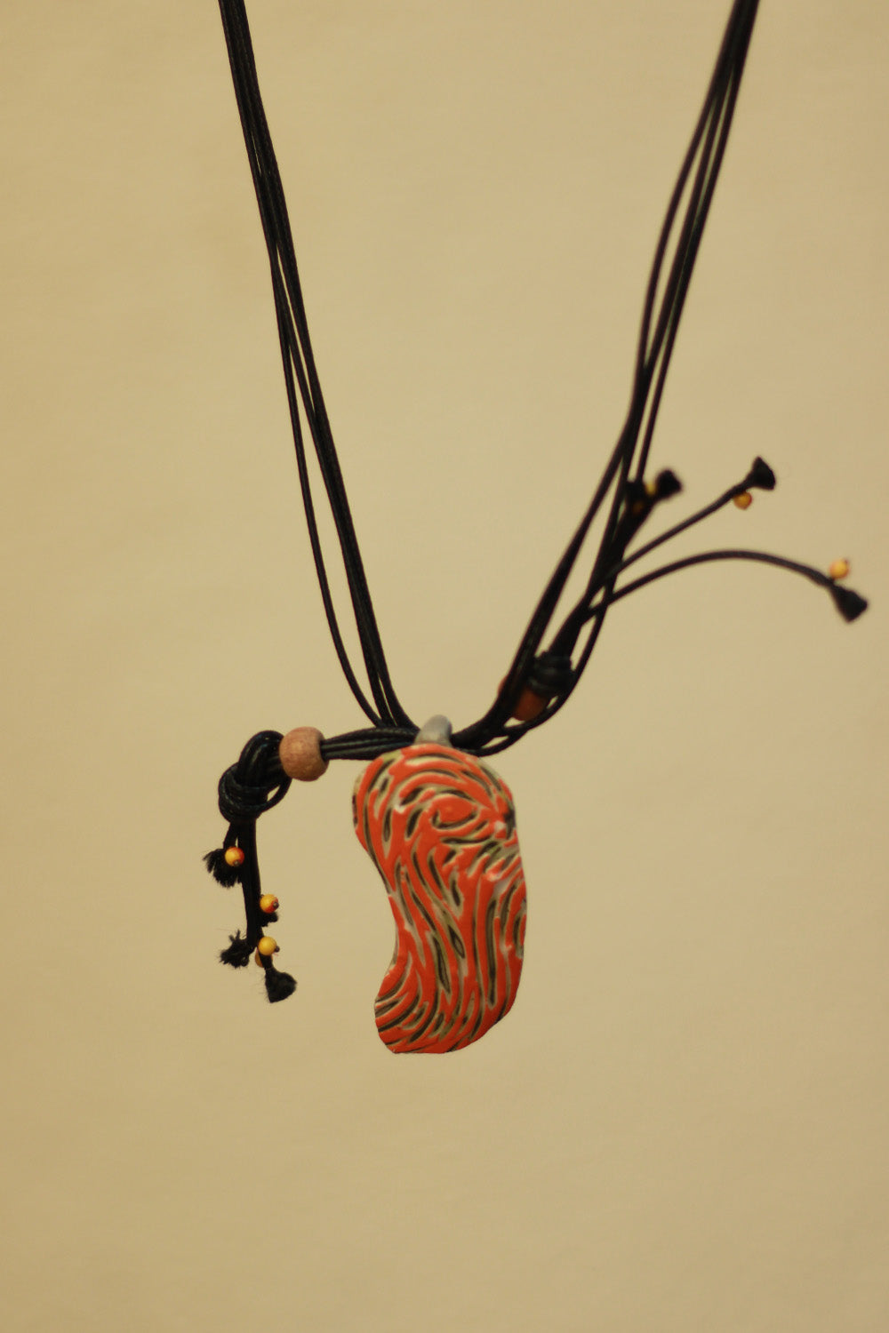 Mrida | Ceramic Necklace | Orange Swirl Pendant