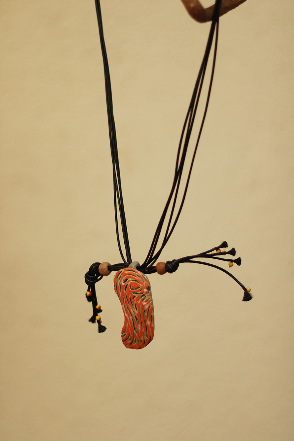 Mrida | Ceramic Necklace | Orange Swirl Pendant