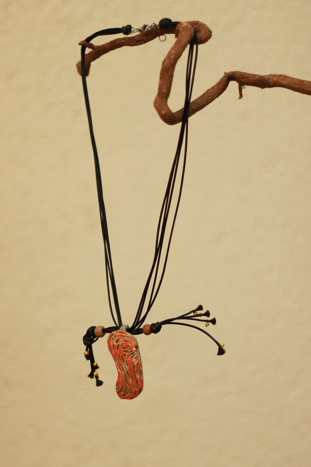 Mrida | Ceramic Necklace | Orange Swirl Pendant