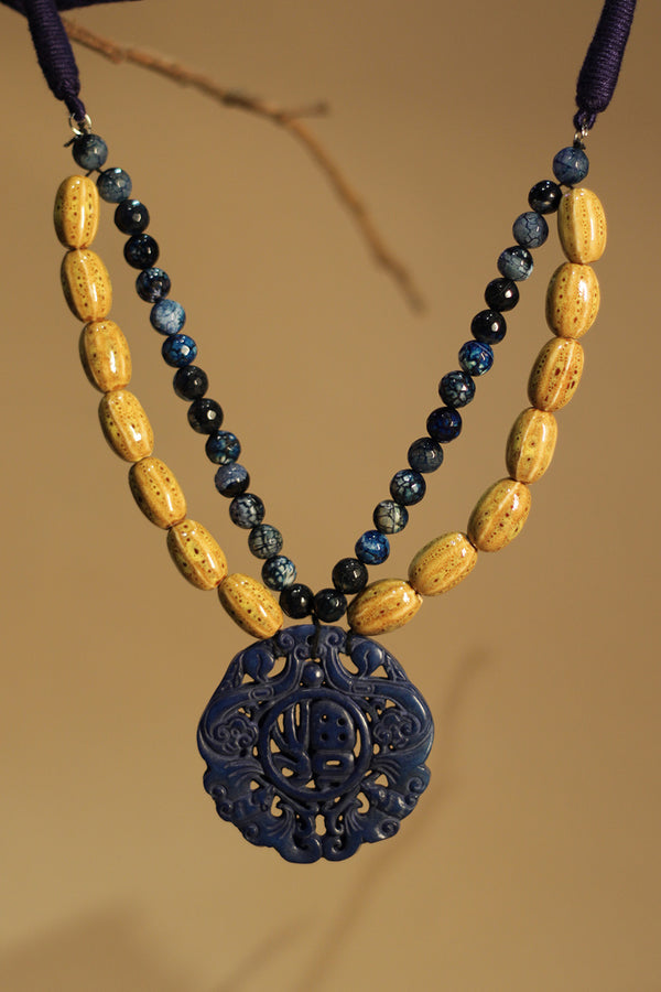 Shruti | Beaded Necklace | Agates, Ceramic Beads with Carved Stone Pendant